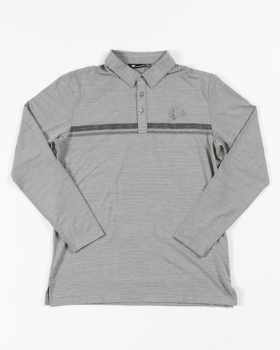 TravisMathew heather grey long sleeve polo with embroidered tonal primary logo on left chest - front lay flat
