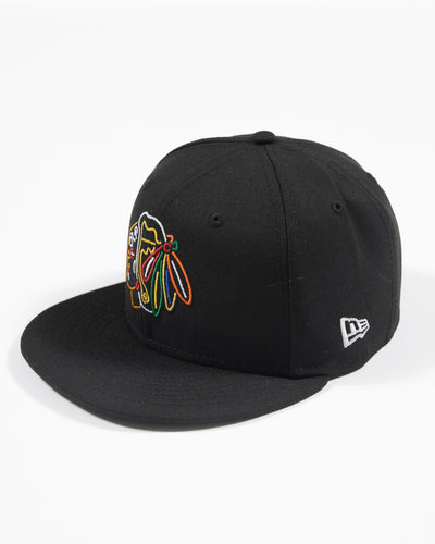 New Era black fitted hat with neon lights inspired primary logo - angled left side view