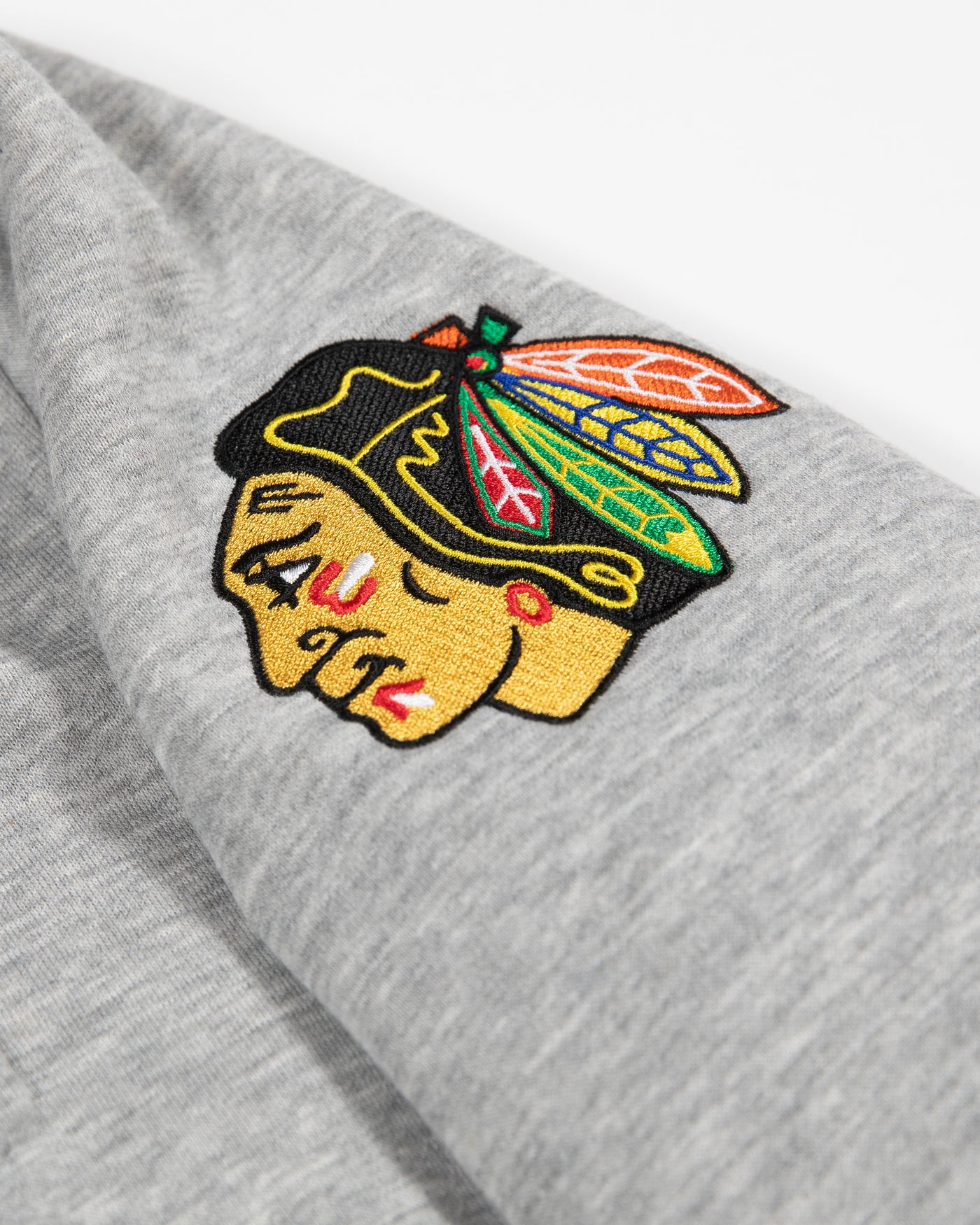 Wild Collective Ladies Chicago Blackhawks Embossed Striped Bomber