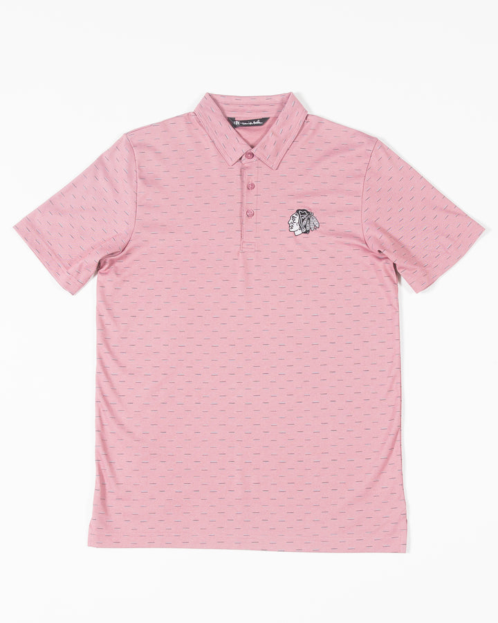 red geo print TravisMathew polo with embroidered tonal Chicago Blackhawks primary logo on left chest - front lay flat