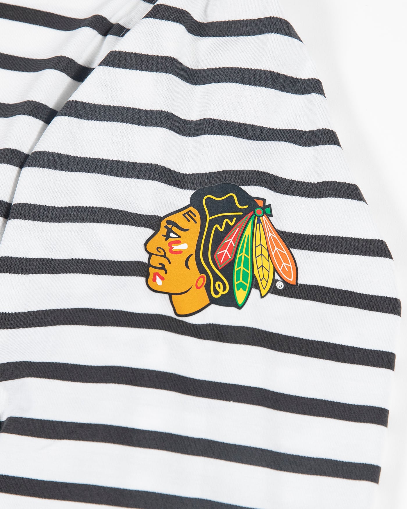 black and white striped lululemon long sleeve tee with Chicago Blackhawks primary logo on left shoulder - detail lay flat