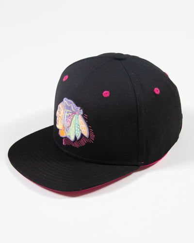black Outerstuff youth neon snapback with Chicago Blackhawks primary logo on front - left side lay flat