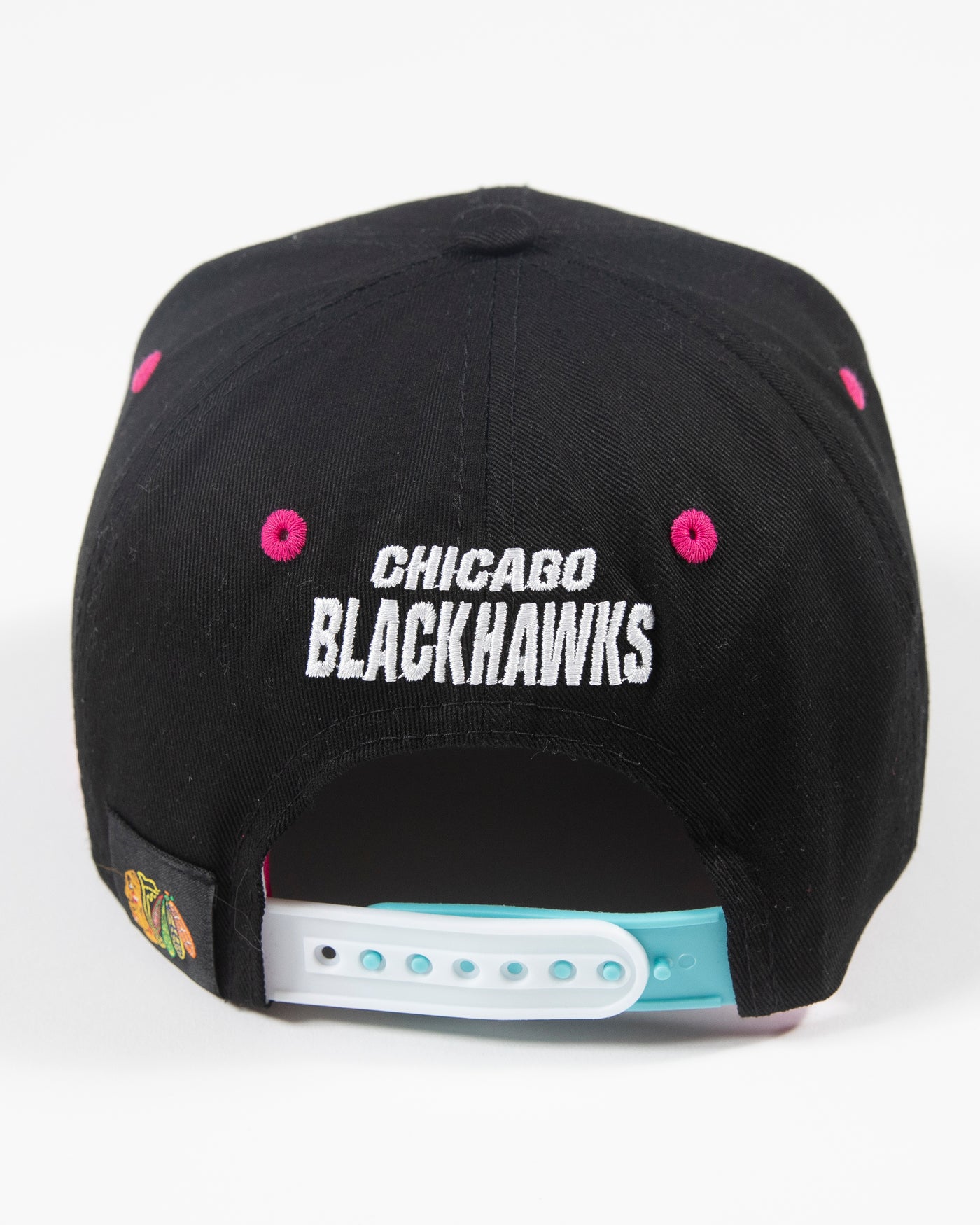 black Outerstuff youth neon snapback with Chicago Blackhawks primary logo on front - back lay flat