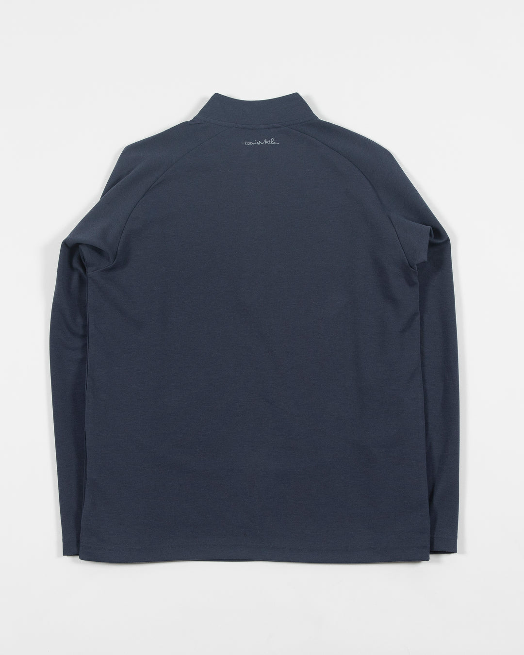 navy TravisMathew quarter zip with Chicago Blackhawks primary logo embroidered on left shoulder - back lay flat