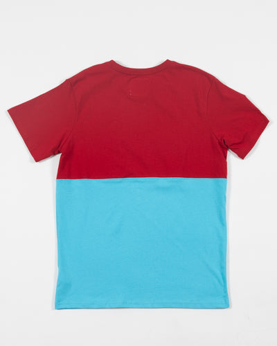 Sport Design Sweden colorblock short sleeve tee with Chicago Blackhawks primary logo on left chest and Chicago four stars embroidered on bottom left corner - back lay flat