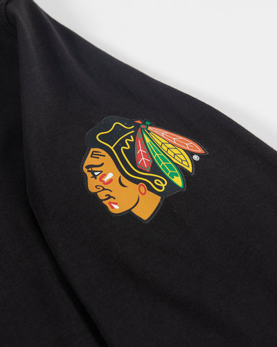lululemon black long sleeve with Chicago Blackhawks primary logo on left shoulder - detail lay flat