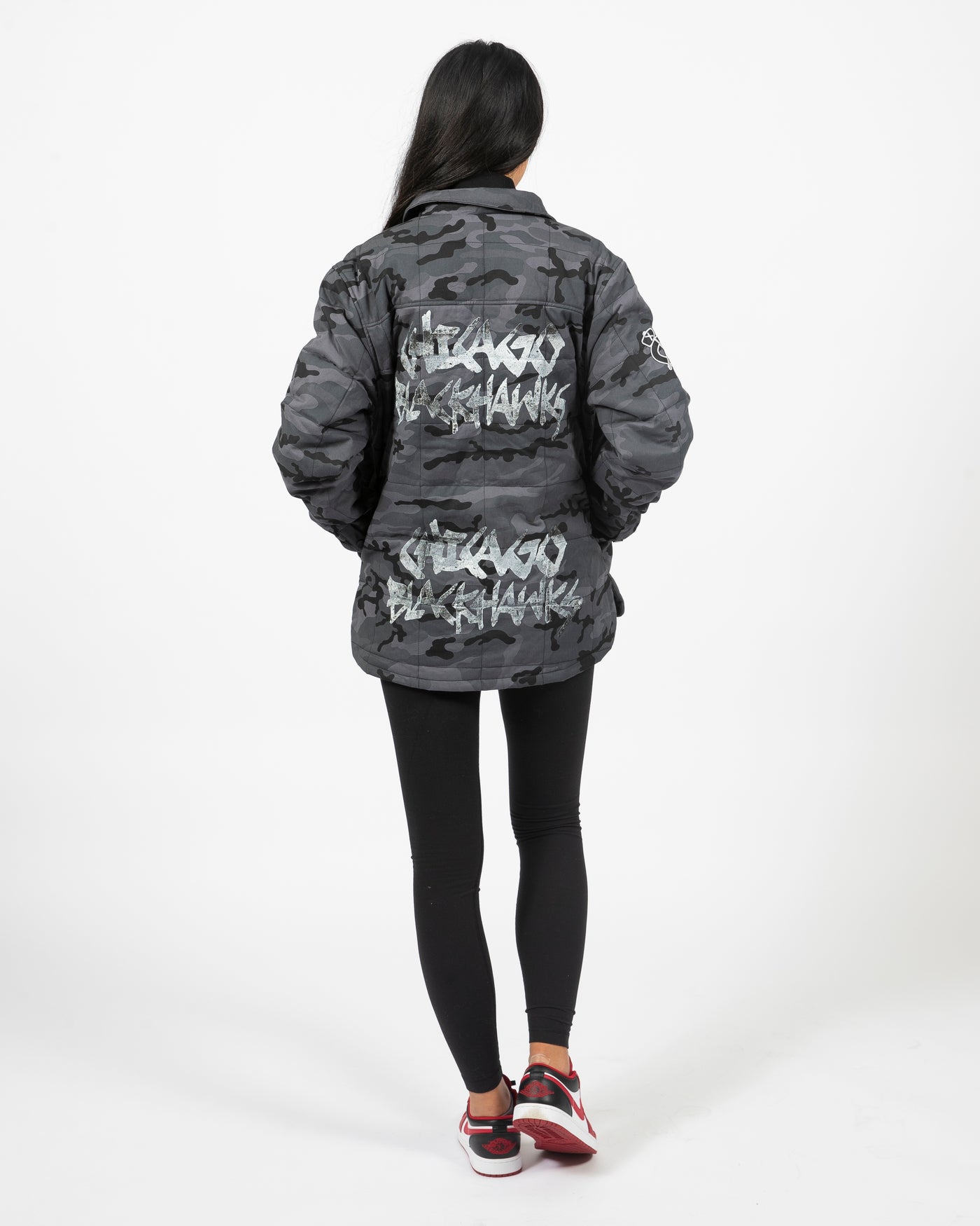 Wild Collective oversized camo print zip up jacket with Blackhawks primary logo and Chicago flag on front and Chicago Blackhawks on back - back view