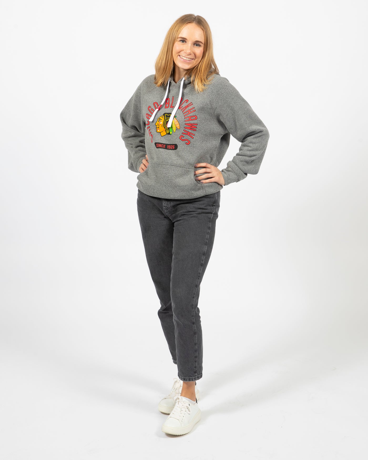 Sportiqe grey Chicago Blackhawks hoodie with primary logo and wordmark graphic on center chest - women's front view