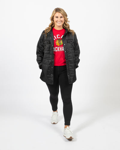 Sportiqe Chicago Blakhawks black puffer shirt jacket with primary logo on left sleeve - women's front view