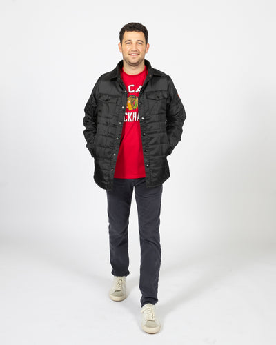 Sportiqe Chicago Blakhawks black puffer shirt jacket with primary logo on left sleeve - men's front view