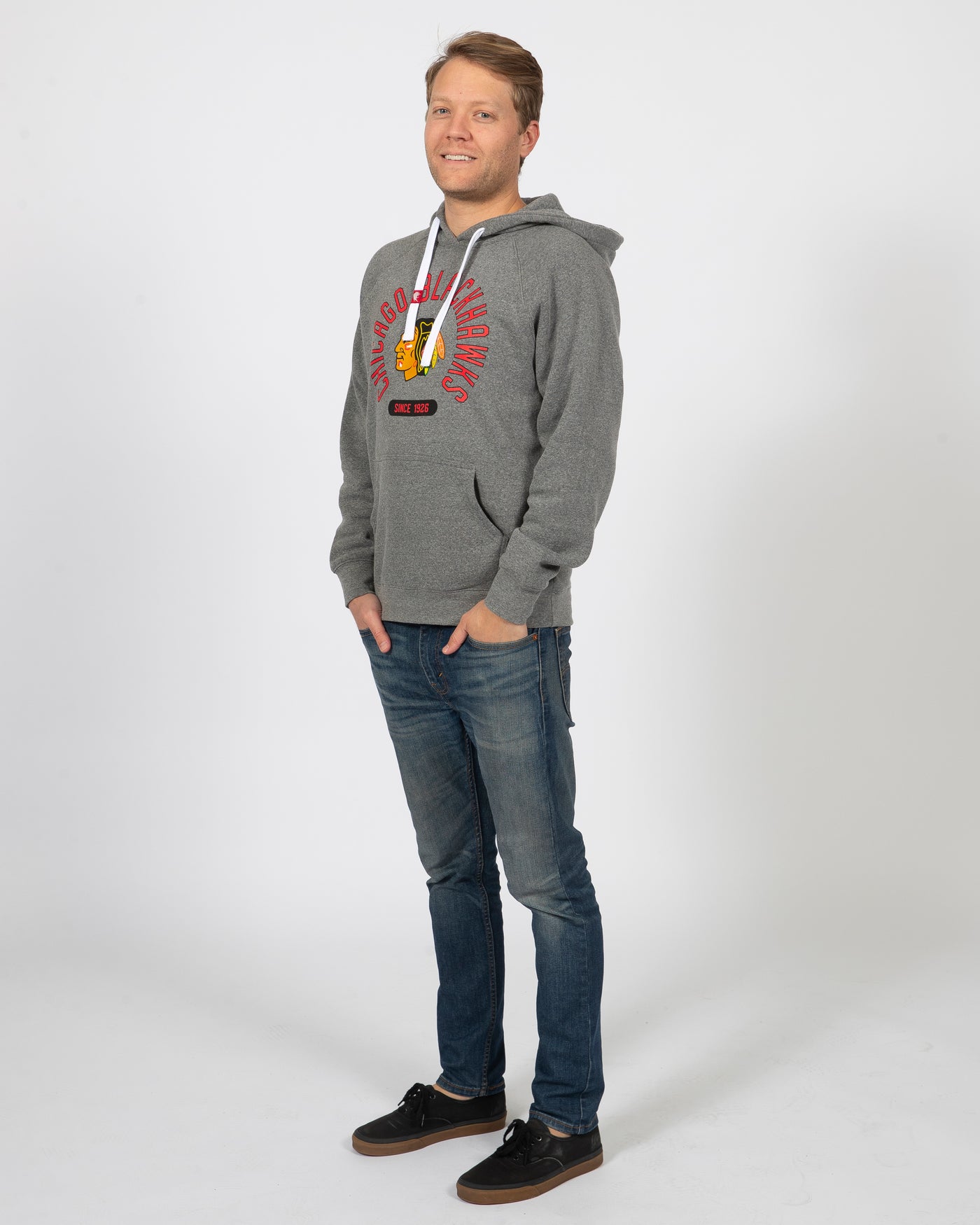Sportiqe grey Chicago Blackhawks hoodie with primary logo and wordmark graphic on center chest - men's front view