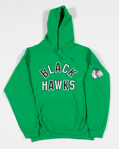 green St. Patrick's Day hoodie with black and white Chicago Blackhawks primary logo on left shoulder - front lay flat