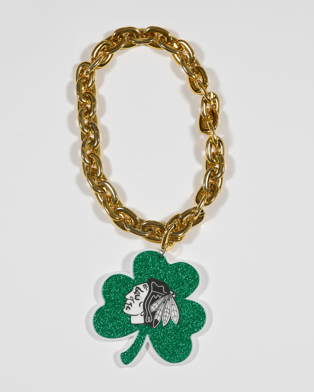 Chicago Blackhawks logo on green shamrock pendant on large gold chain - front lay flat