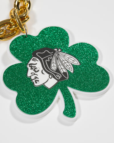 Chicago Blackhawks logo on green shamrock pendant on large gold chain - detail lay flat